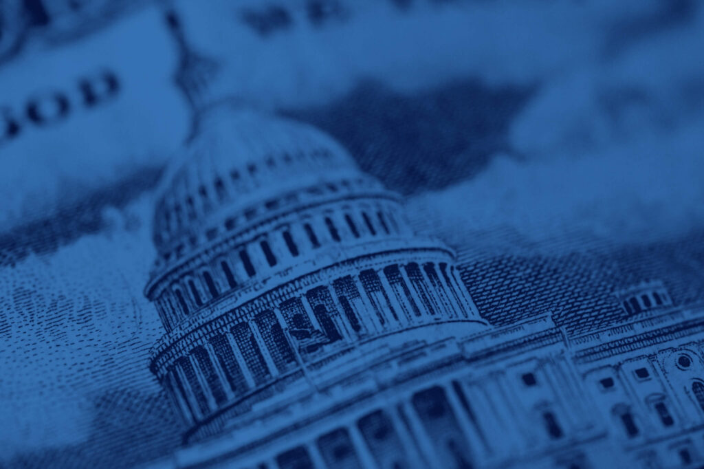 This crop of the United States Capitol building in Washington, D.C., highlights the detail in the Capitol dome. The backdrop is a blue sky with scattered clouds.