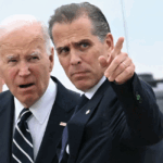 Then-President Joe Biden talks with his son Hunter Biden at Delaware Air National Guard Base in New Castle, Delaware, on June 11, 2024. (Andrew Caballero/AFP via Getty Images)