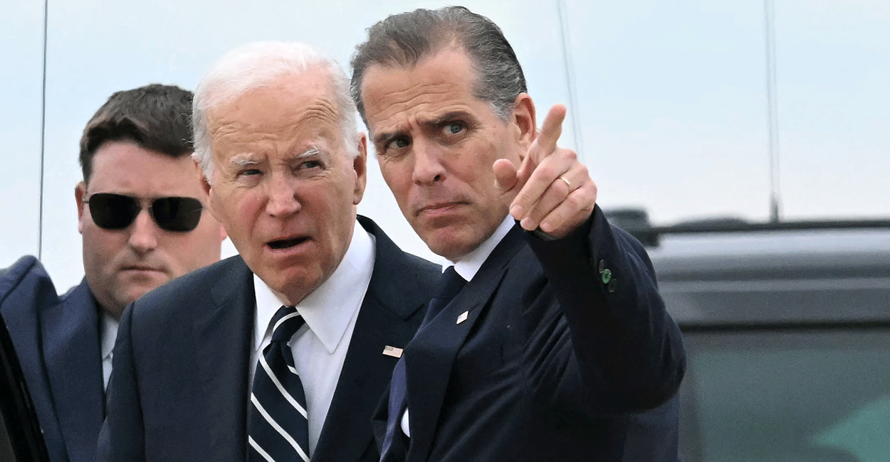 Then-President Joe Biden talks with his son Hunter Biden at Delaware Air National Guard Base in New Castle, Delaware, on June 11, 2024. (Andrew Caballero/AFP via Getty Images)