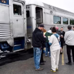 People boarding a train