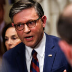 Mike Johnson speaks to reporters in the Capitol.