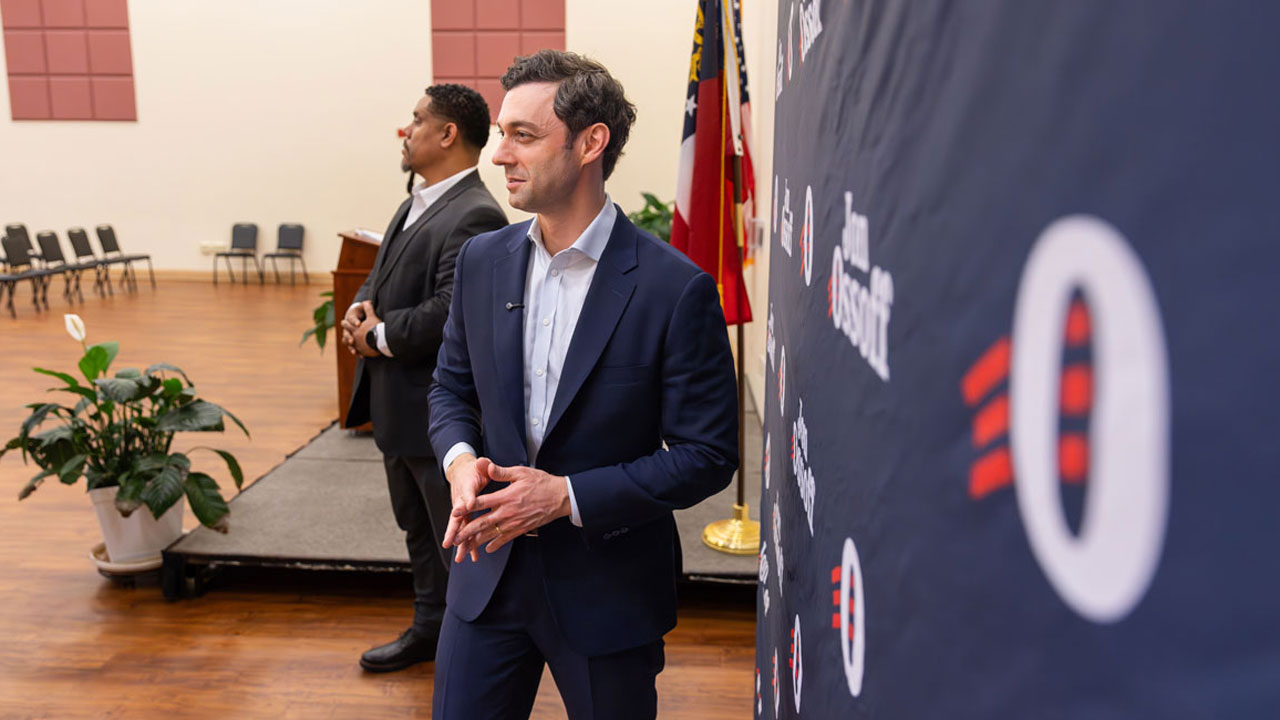Sen. Jon Ossoff speaks with supporters.