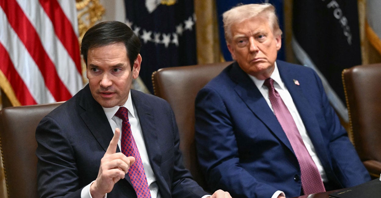 Secretary of State Marco Rubio and President Donald Trump speak at a cabinet meeting.
