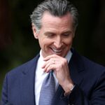 Newsom’s Montana Vacation Stirs Scrutiny of California Travel Bans