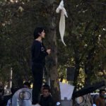 As American Women Put Their Pink Hats Back On, Women in Iran Rip Off Their Hijabs