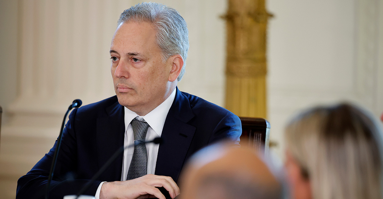 David Sacks looks ahead with crossed arms