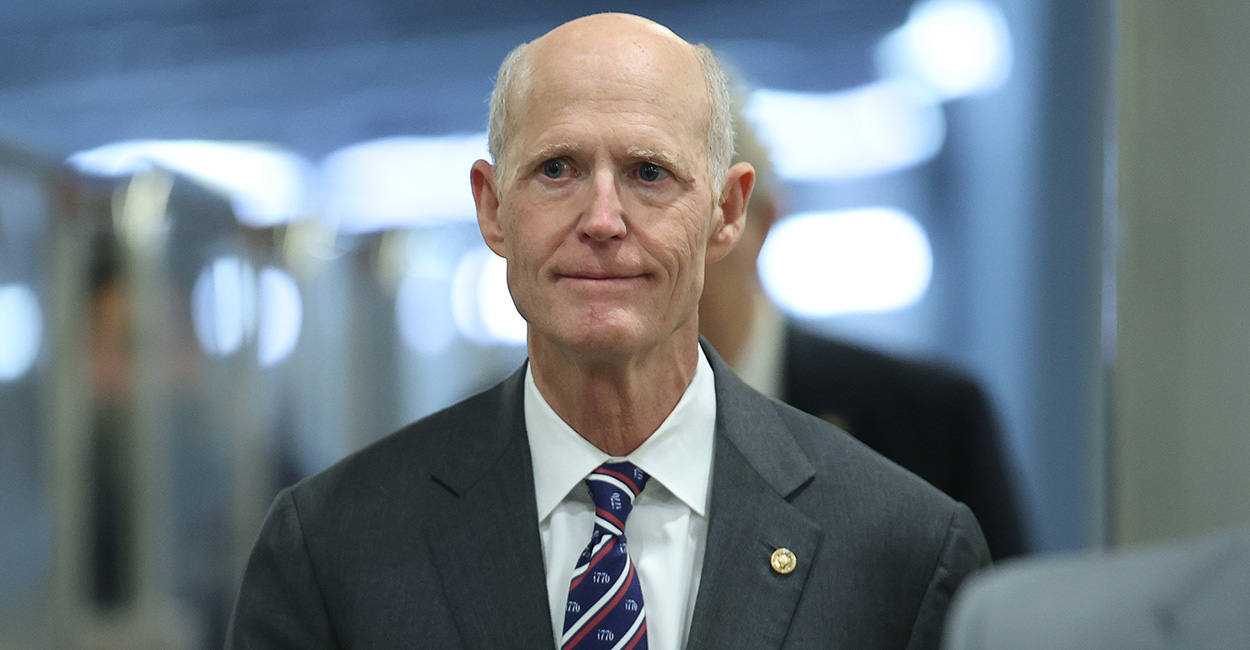 Rick Scott smiles