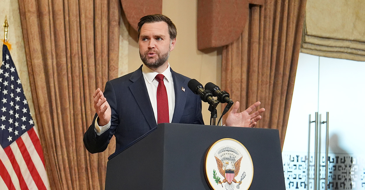 Vance talks at a podium
